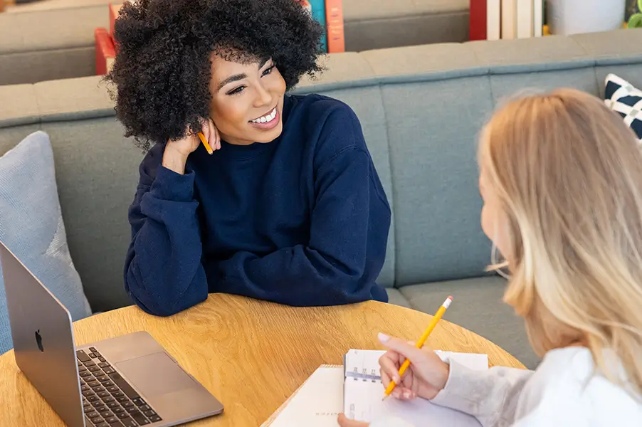two friends studying together