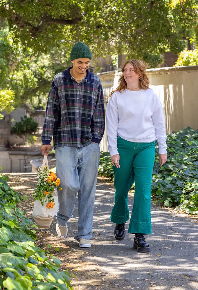 two friends walking outside
